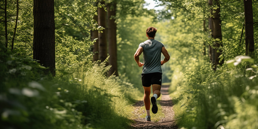 man running in a forest